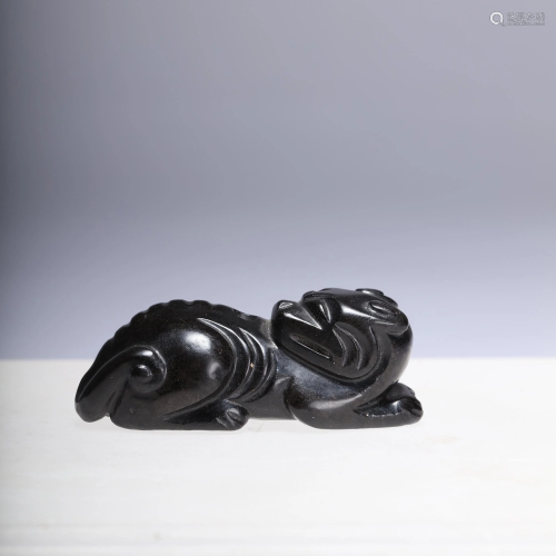 A Carved Black Jade Auspicious Beast Figure