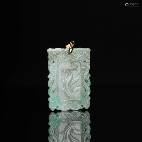 A Carved Jade Floral Pendant