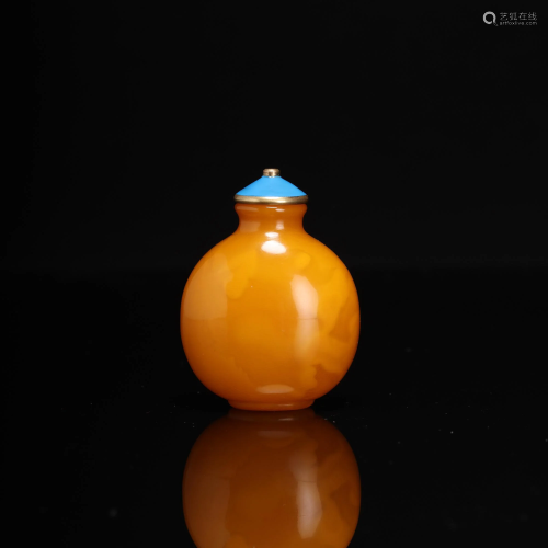 A Carved Amber Snuff Bottle