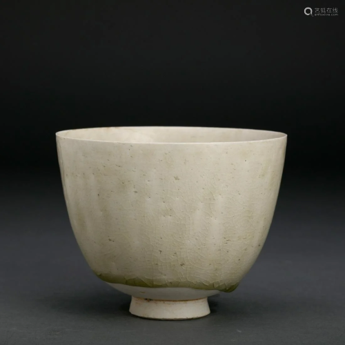 A White Glazed Lobed Cup