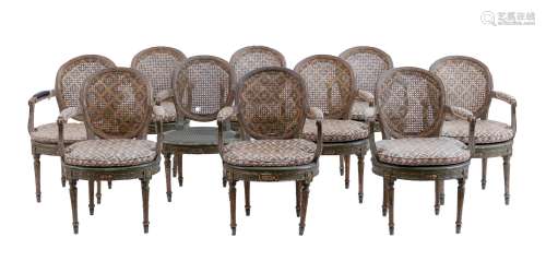 Série de dix chaises à accoudoirs. Epoque Louis XVI.Noyer re...