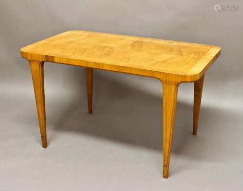 SWEDISH DESIGNER COFFEE TABLE with a rectangular shaped top ...