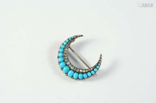 A TURQUOISE AND DIAMOND CLOSED CRESCENT BROOCH mounted with ...