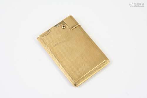 A 9CT GOLD 'WAFER' LIGHTER BY ASPREY & CO with engine turned...
