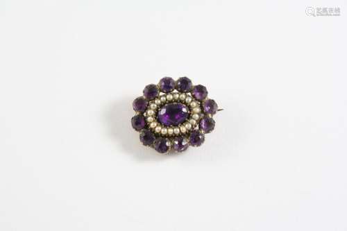 A GEORGIAN AMETHYST AND PEARL BROOCH the oval shaped brooch ...
