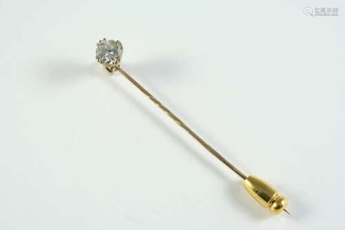 A DIAMOND STICK PIN mounted with a brilliant-cut diamond, in...