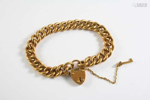 AN 18CT GOLD CURB LINK BRACELET with padlock clasp and key, ...