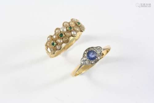 A GEORGIAN EMERALD AND PEARL SET RING formed with four half ...