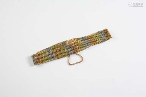 A 15CT THREE COLOUR GOLD FINE MESH LINK BRACELET with concea...