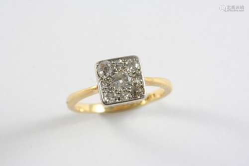 A DIAMOND CLUSTER RING the plaque shaped ring is millegrain ...