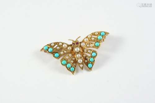 A TURQUOISE AND PEARL BUTTERFLY BROOCH formed with four grad...