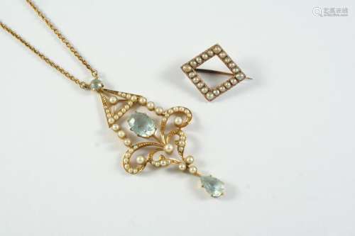 AN EDWARDIAN AQUAMARINE AND PEARL SET PENDANT the 15ct gold ...