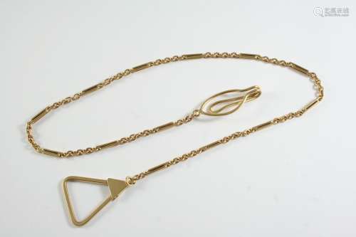 A 9CT GOLD WATCH CHAIN formed with long and short gold links...