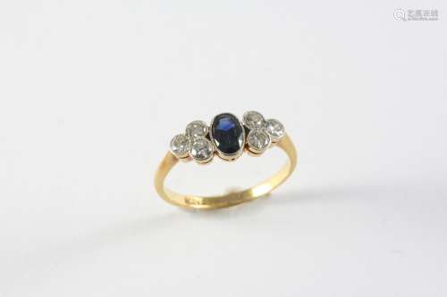 A SAPPHIRE AND DIAMOND RING the oval-shaped sapphire is set ...