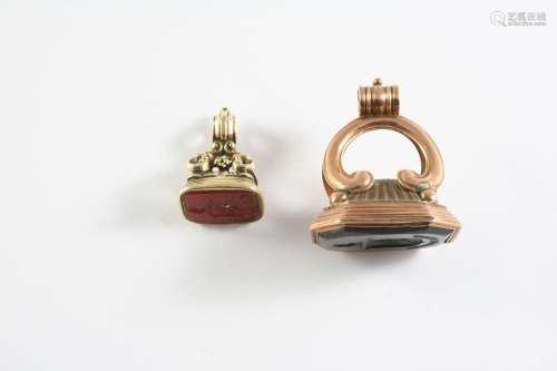 A GOLD SEAL mounted with a smoky quartz matrix carved with a...