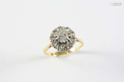 A DIAMOND CLUSTER RING the circular-cut diamond is set withi...