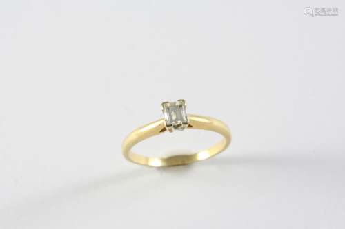 A DIAMOND SOLITAIRE RING set with an emerald-cut diamond in ...