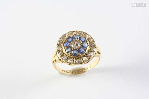 A SAPPHIRE AND DIAMOND CLUSTER RING the central circular dia...