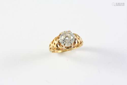 A DIAMOND SOLITAIRE RING the old cushion-shaped diamond is m...