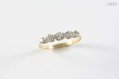 A DIAMOND FIVE STONE RING set with five graduated circular-c...