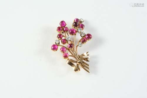 A RUBY, DIAMOND AND GOLD FOLIATE SPRAY BROOCH mounted with c...