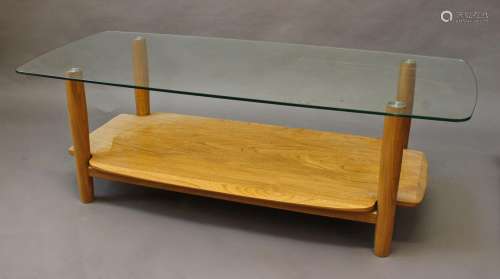 MODERN ERCOL COFFEE TABLE an unusual coffee table with a lig...