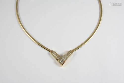 A DIAMOND V-SHAPED NECKLACE set with twenty eight invisible-...