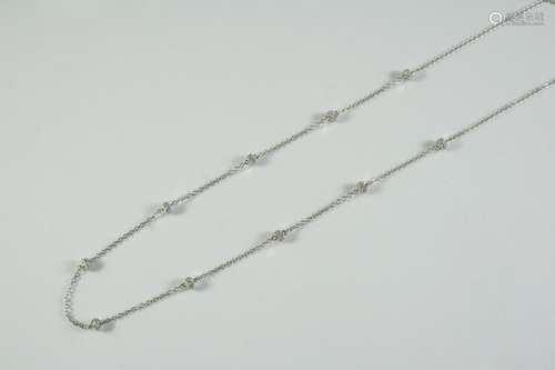 A DIAMOND AND GOLD CHAIN NECKLET the 18ct white gold chain i...