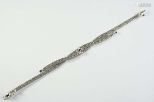 A SAPPHIRE AND GOLD BRACELET the 18ct white gold bracelet mo...