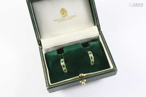 A PAIR OF EMERALD AND DIAMOND HALF HOOP EARRINGS each earrin...