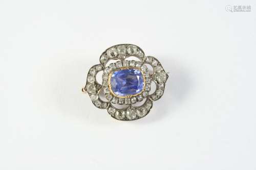 A VICTORIAN QUATREFOIL SAPPHIRE AND DIAMOND BROOCH the oval-...
