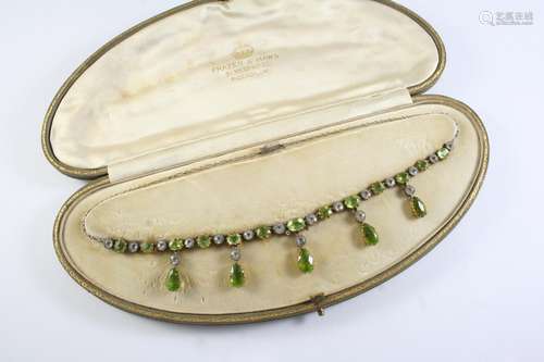 A PERIDOT AND WHITE STONE DROP NECKLACE the necklace formed ...