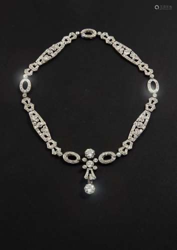 AN ART DECO DIAMOND NECKLACE formed with openwork panels of ...