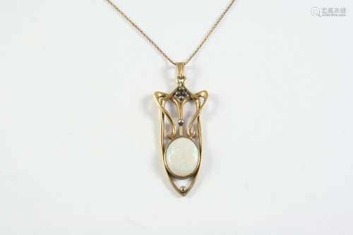 AN OPAL AND GOLD PENDANT the oval-shaped white opal is set w...