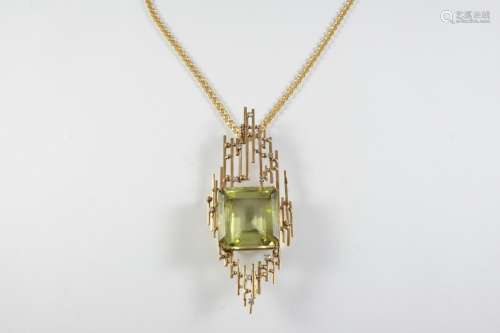 A GOLD, CITRINE AND DIAMOND PENDANT the gold abstract openwo...