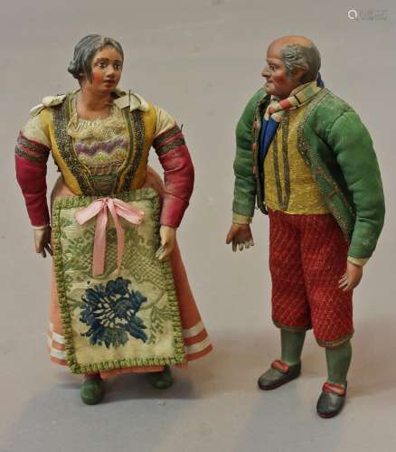 AN UNUSUAL PAIR OF COMPOSITION CHARACTER FIGURES. male and f...