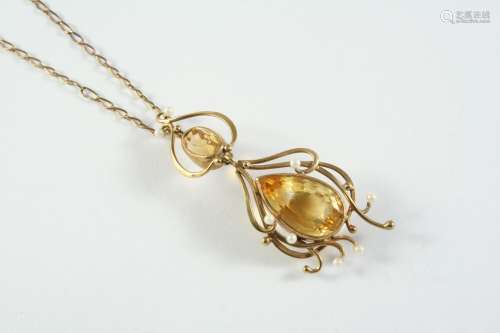 A GOLD, CITRINE AND CULTURED PEARL PENDANT the gold openwork...