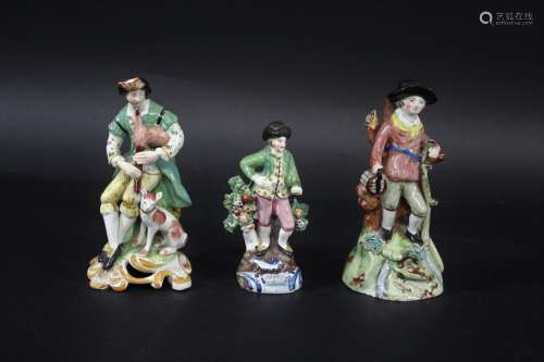 PEARLWARE FIGURES including a figure of a Bagpipe player wit...