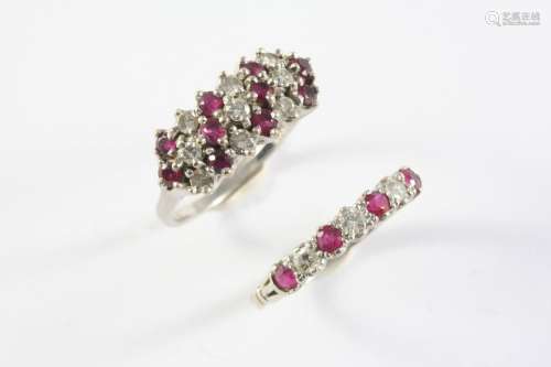 A RUBY AND DIAMOND RING mounted with three rows of alternate...