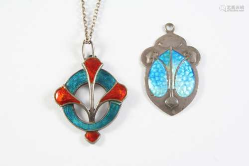 AN ART NOUVEAU SILVER AND ENAMEL PENDANT BY WILLIAM H. HASEL...