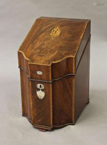 A GEORGE III MAHOGANY KNIFE BOX, with a sloping top with cen...