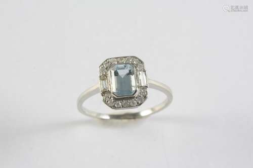 AN AQUAMARINE AND DIAMOND CLUSTER RING the step-cut aquamari...