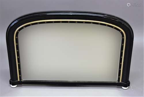 VICTORIAN EBONISED AND PARCEL GILT ARCHED OVERMANTEL MIRROR,...