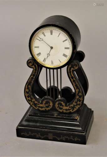 A 19TH CENTURY BRASS INLAID TIME PIECE, with a 8.5cm white e...