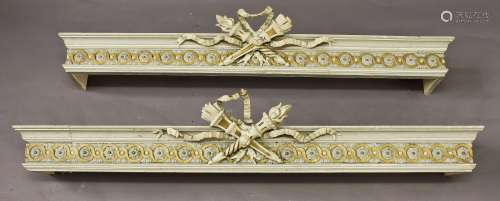 A PAIR OF NEOCLASSICAL STYLE PELMETS, each grey with gilt hi...