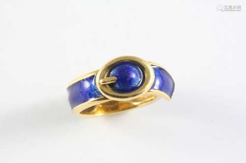 AN ENAMEL AND GOLD BUCKLE RING BY KUTCHINSKY with royal blue...