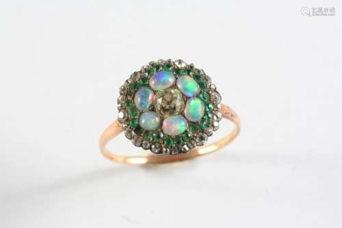 A 19TH CENTURY DIAMOND, EMERALD AND OPAL CLUSTER RING the ce...