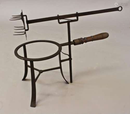 AN UNUSUAL 18TH CENTURY TRIVET TOASTER, with an eight pronge...