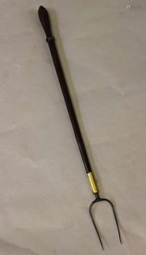 A LONG HANDLED TOASTING FORK, 18th/19th century with a long ...