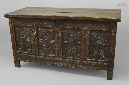 AN OAK COFFER WITH CARVED FOUR PANEL FRONT, late 17th/early ...